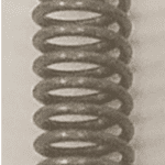A close up of the springs on a metal object.