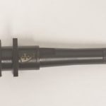 A black rod with a gold crown on it.