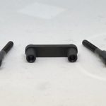 A black handle and two other black handles