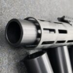A close up of the barrel on a rifle
