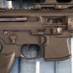 A close up of the trigger on an ar-1 5