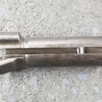 A close up of the bottom part of a gun