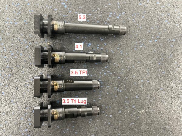 A set of four different types of ignition coils.