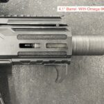 A close up of the barrel and trigger on an ar 1 5