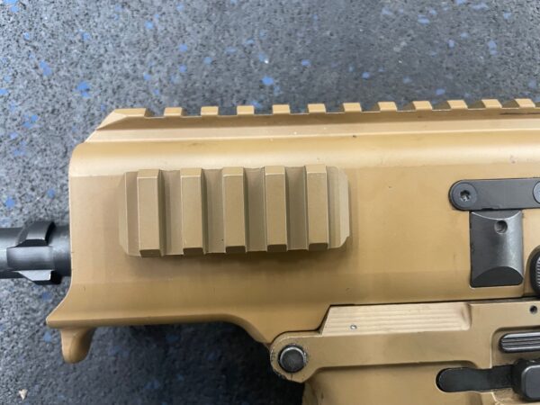 A close up of the side rail on an ar-1 5