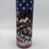 A candle that has an image of a woman holding guns.