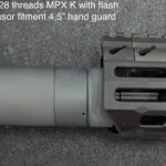 A close up of the front end of an mp-k with flash.