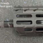 A close up of the barrel and hand guard on an ar-1 5