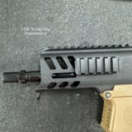 A close up of the barrel and handguard on an ar 1 5