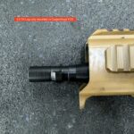 A close up of the barrel on an ar 1 5