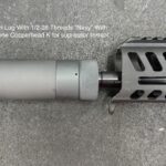 A close up of the barrel and forend on an ar-1 5