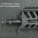 A close up of an ar 1 5 with the suppressor removed