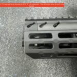 A close up of the top part of an ar-1 5 rifle.