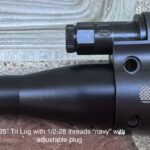 A close up of the side of a rifle