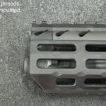 A close up of the top part of an ar-1 5 rifle.
