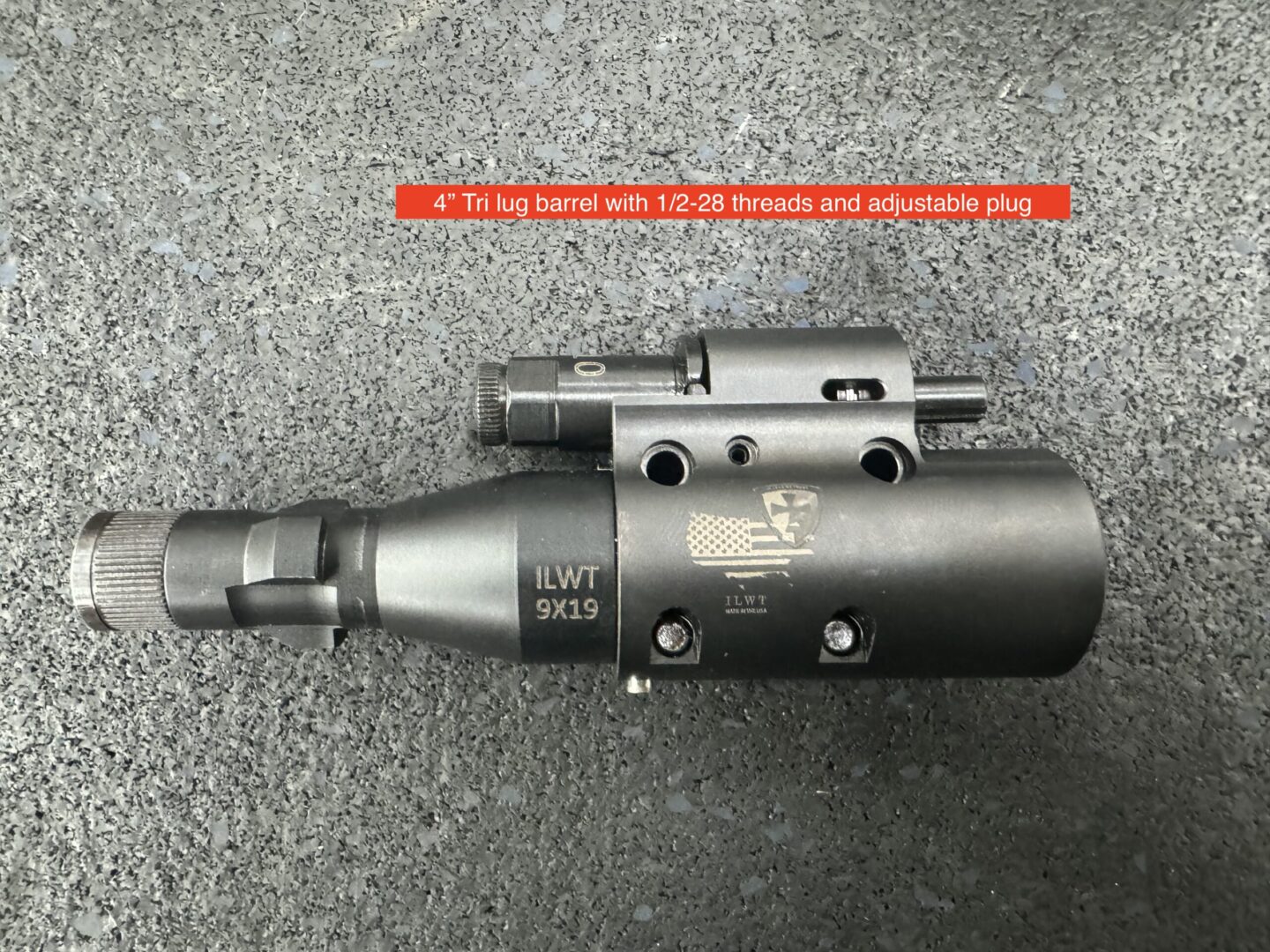 A gun that is sitting on the ground.