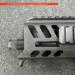 A close up of the top part of an ar-1 5 rifle.